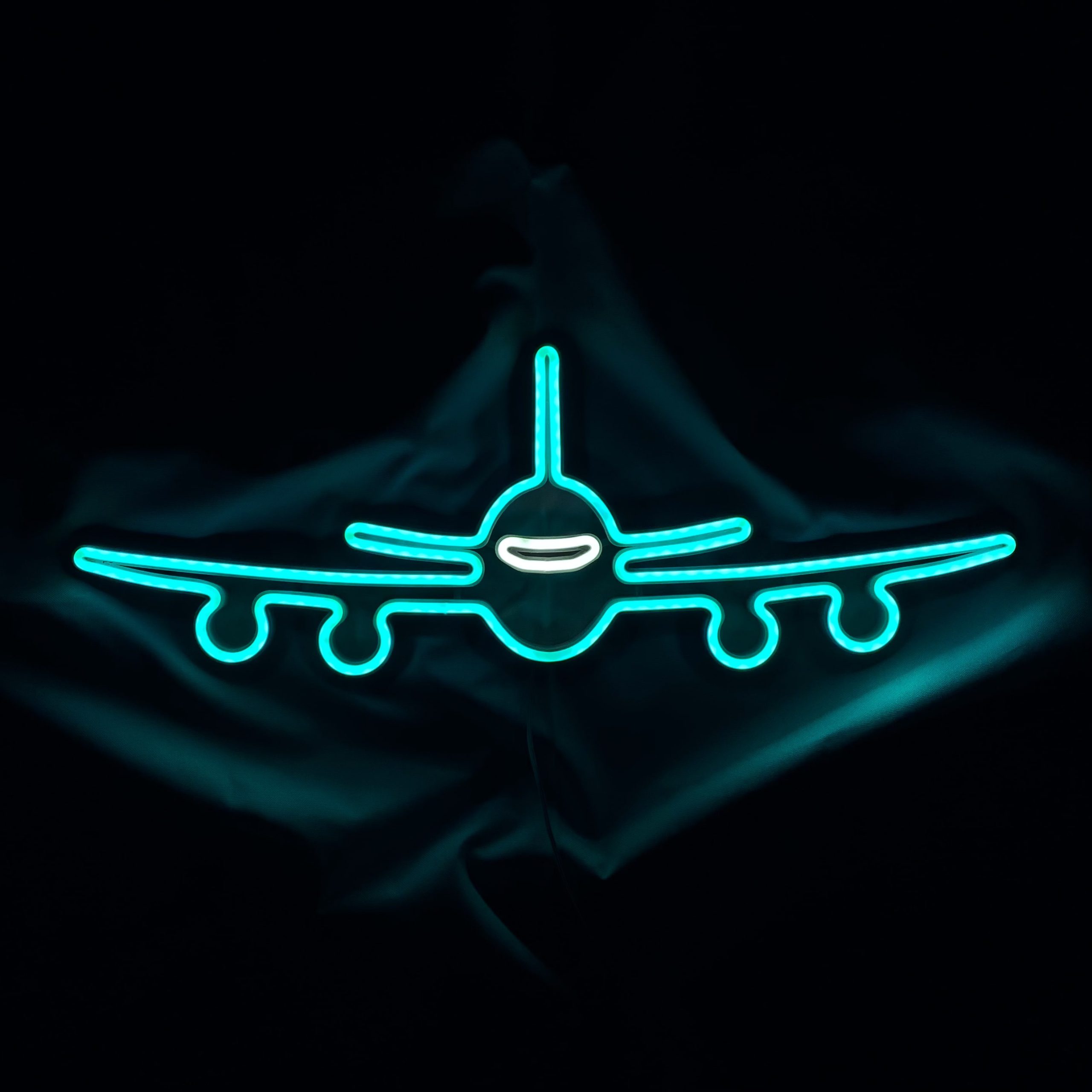 Neon samolot błękitny i biały